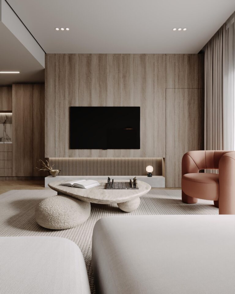 Modern house design featuring a timber feature wall, low white sofa and rust accent armchair
