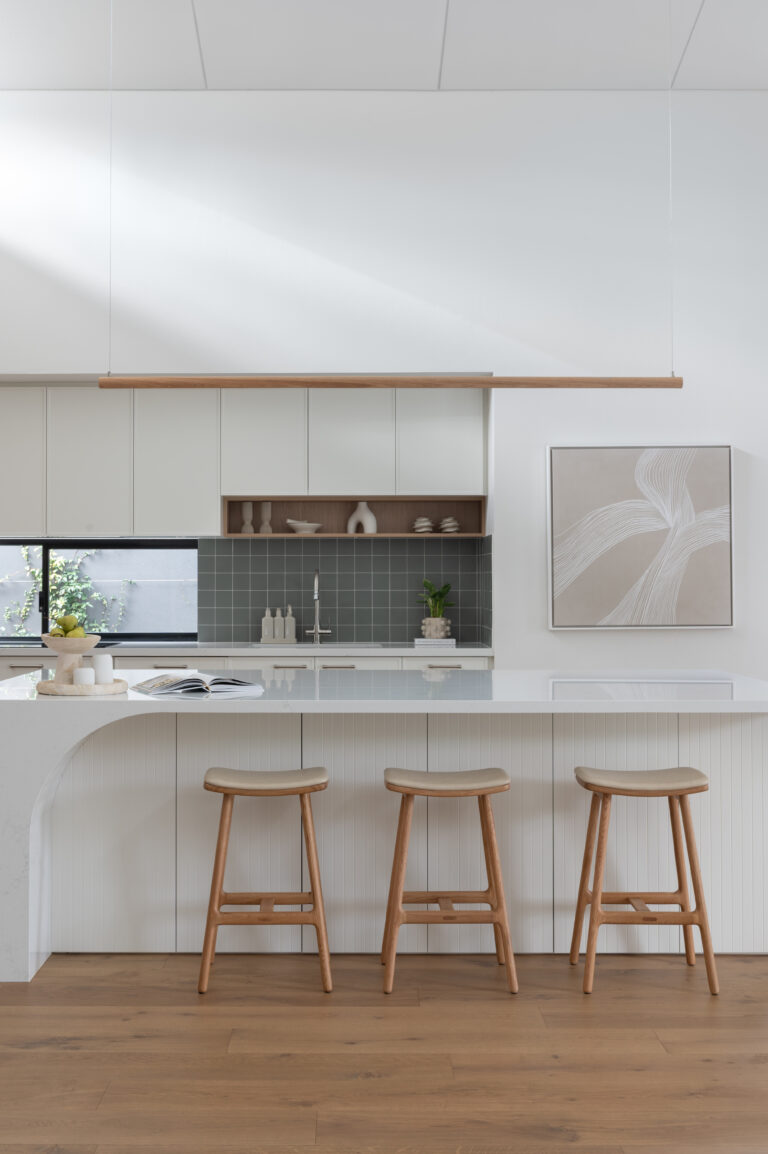 Modern white kitchen with natural light, showing kitchen renovation ideas for Perth homes